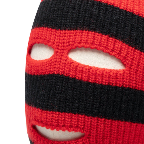 Close-up of red and black striped knitted balaclava