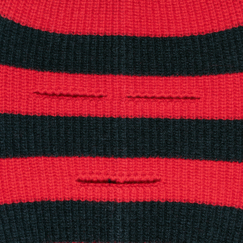 Close-up of red and black striped knitted balaclava