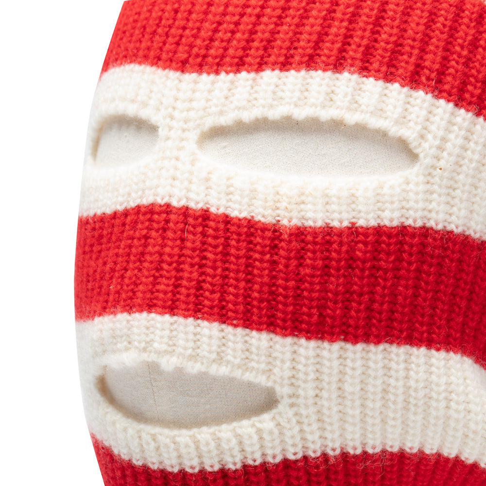 Close-up of red and black striped knitted balaclava