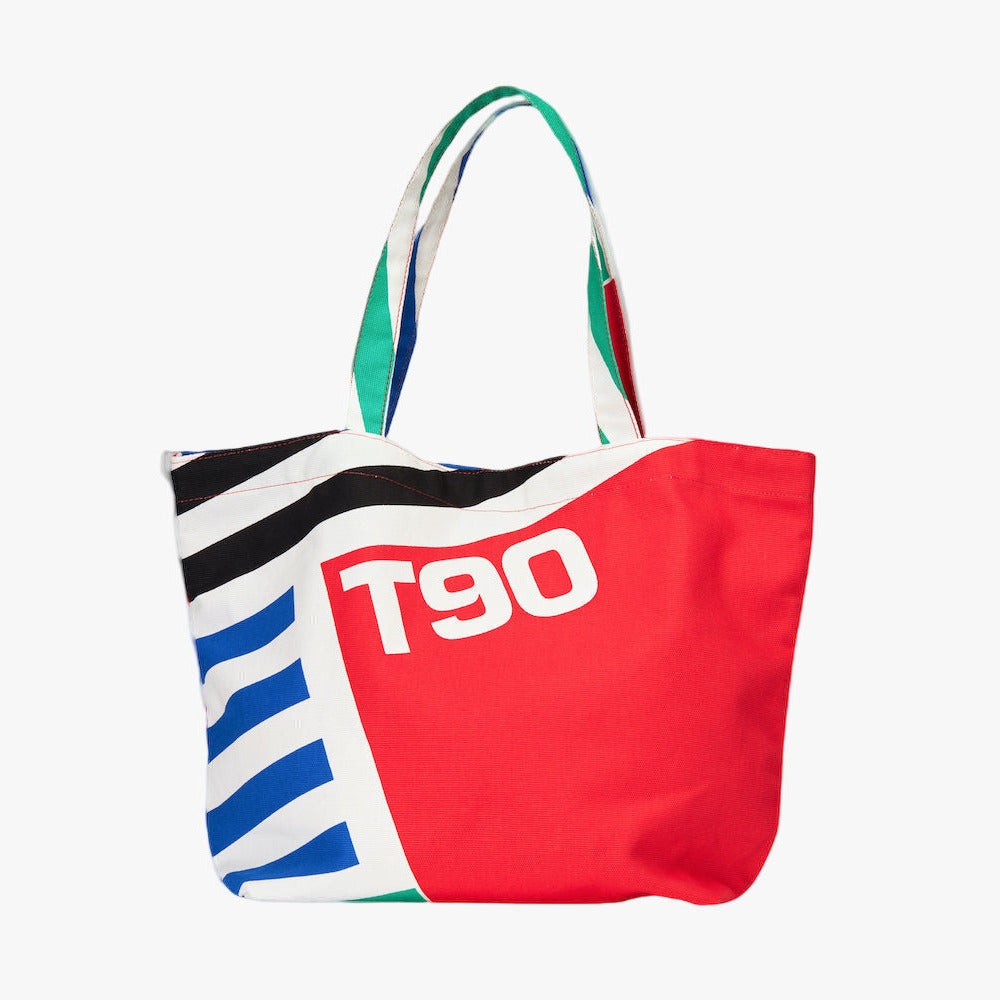 Colorful tote bag with 'T90' branding on a white background