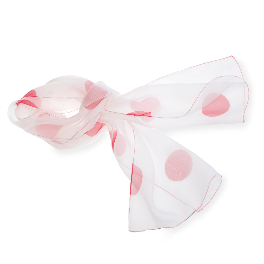 White scarf with red polka dots on a white background