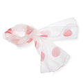 White scarf with red polka dots on a white background