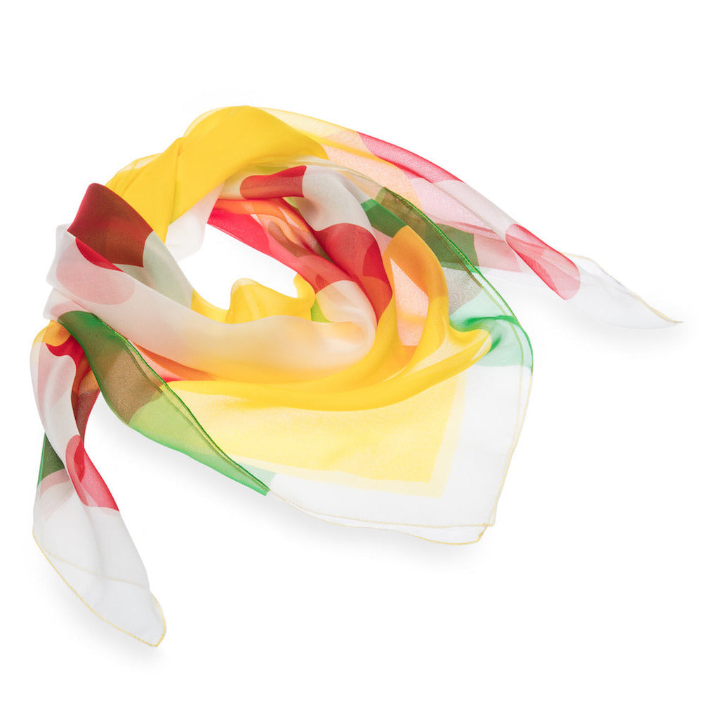 Colorful silk scarf with a red dot pattern on a white yellow and green background