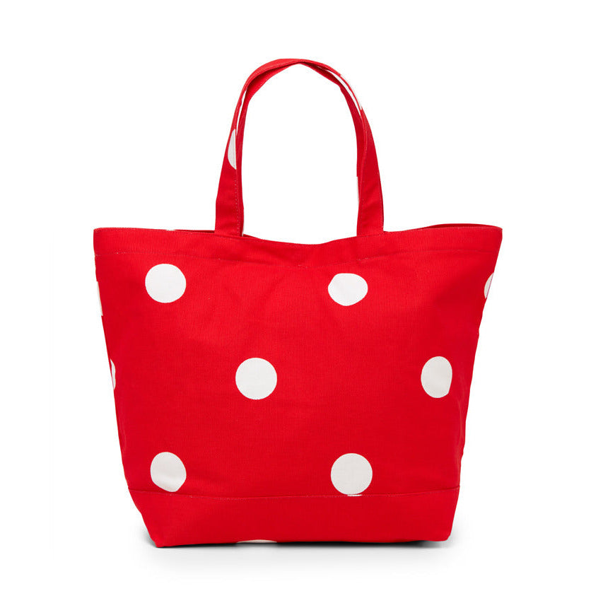 Red tote bag with white polka dots on a white background